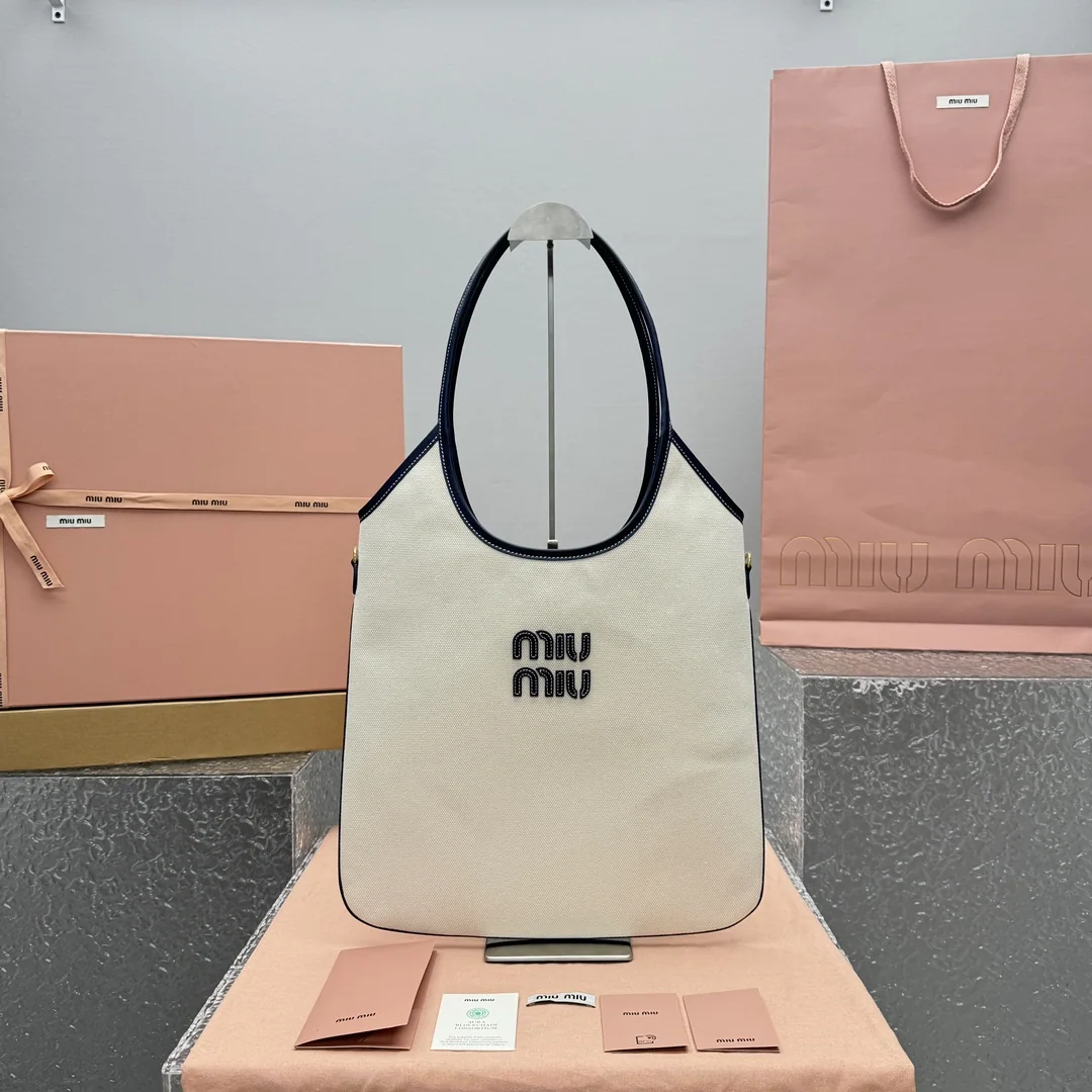 미우미우 블루 캔버스 호보백 68231