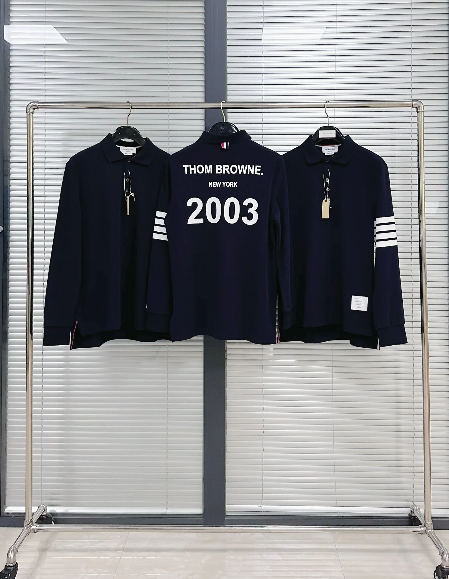 톰브라운 20 주년 한정 긴팔 폴로셔츠 142930