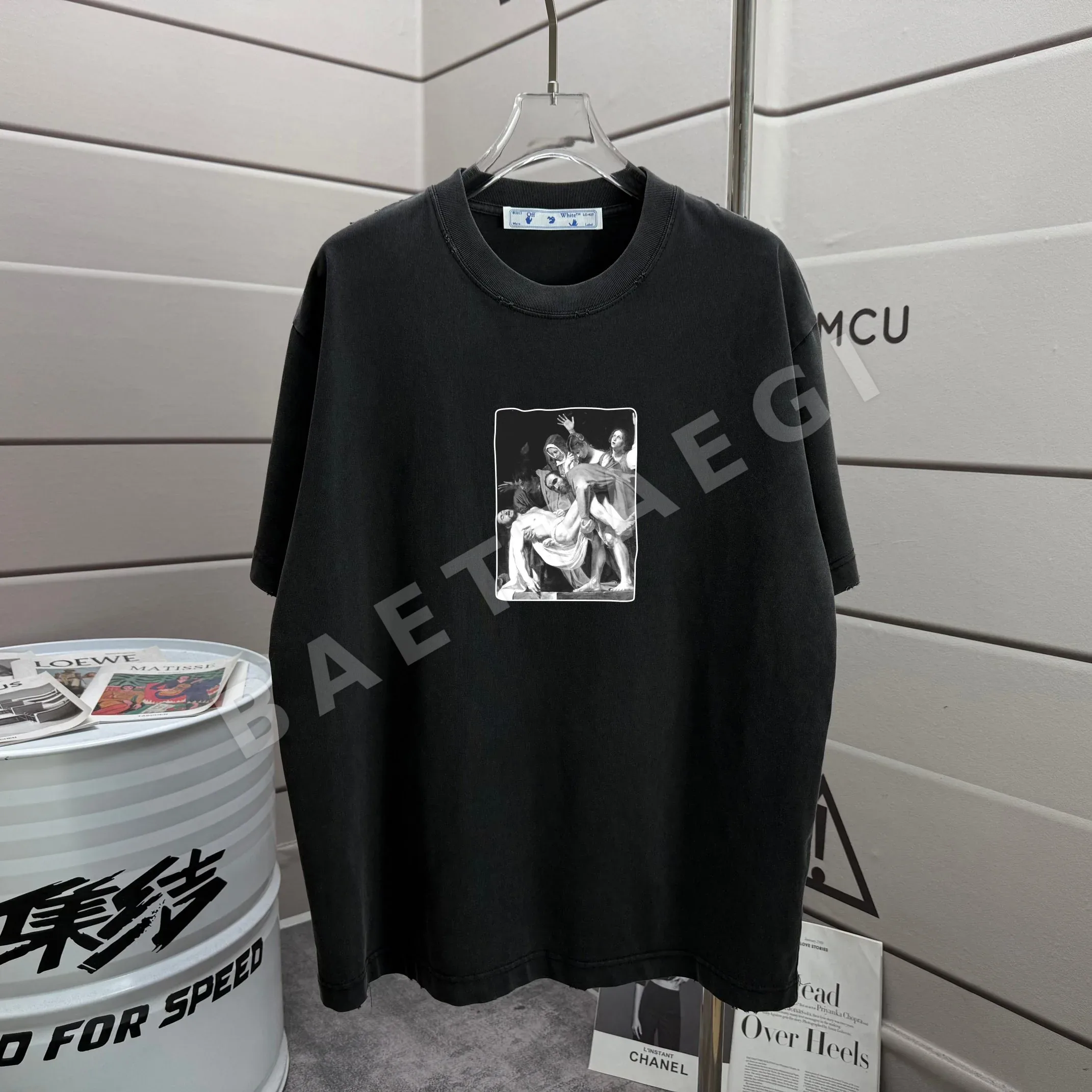 오프화이트 워시 가공 루즈핏 크루넥 반팔 티셔츠 상세 이미지 2