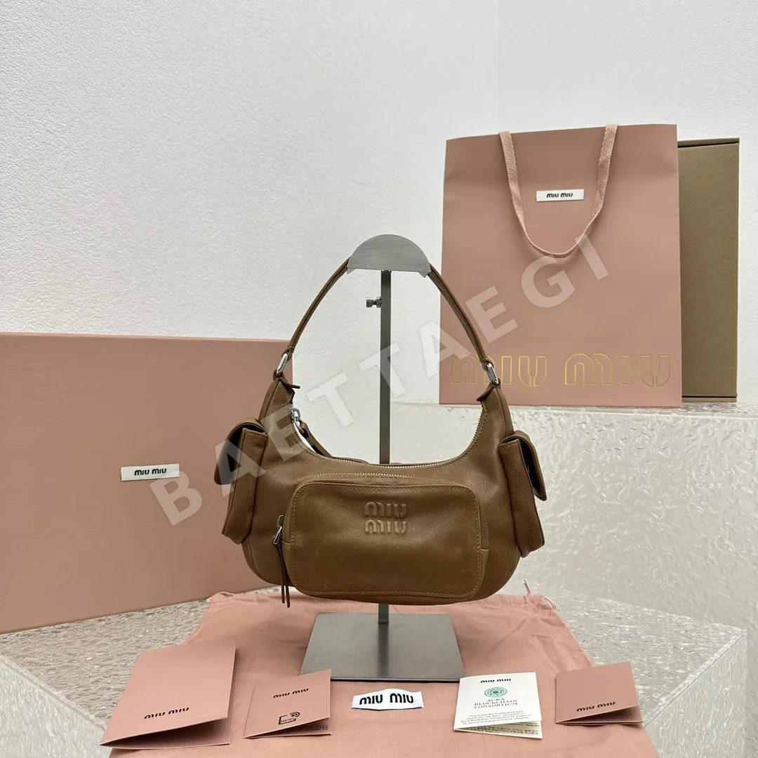 미우미우 캐러멜 빈티지 모터사이클 가방 상세 이미지 1