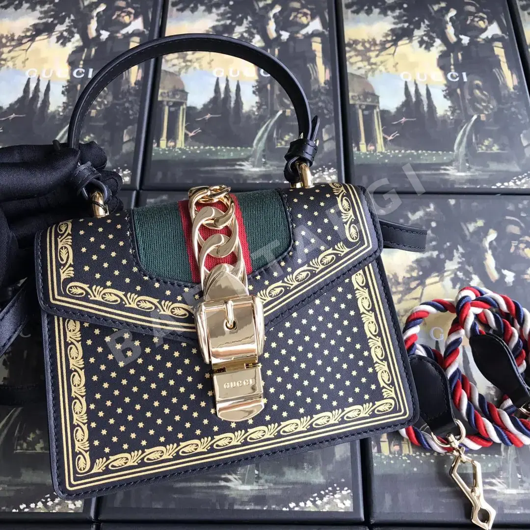 구찌 미니 골드 트림 웨빙 숄더백 470270