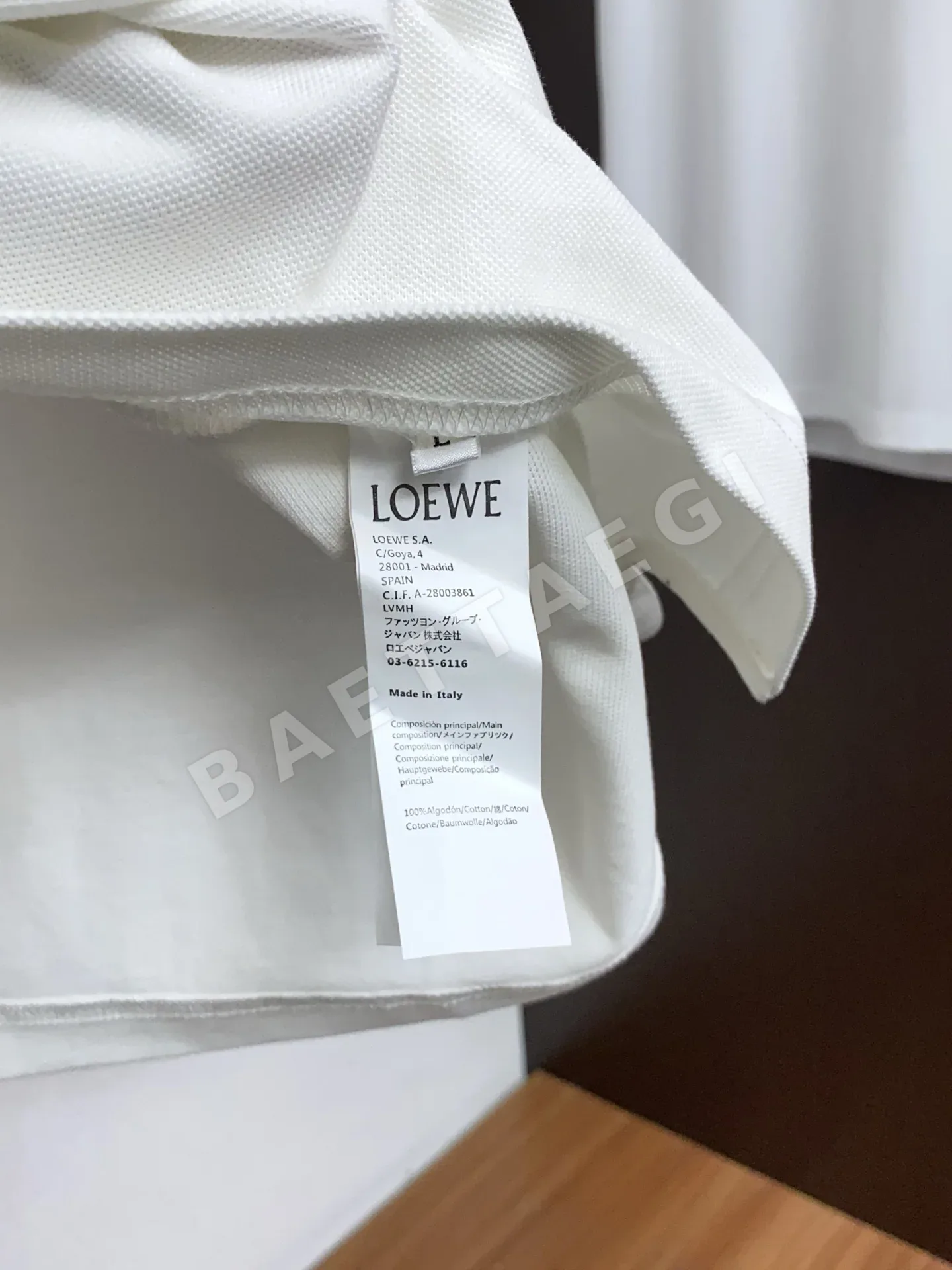로에베 체크 카라 가죽 로고 남성 반팔 폴로셔츠 상세 이미지 6