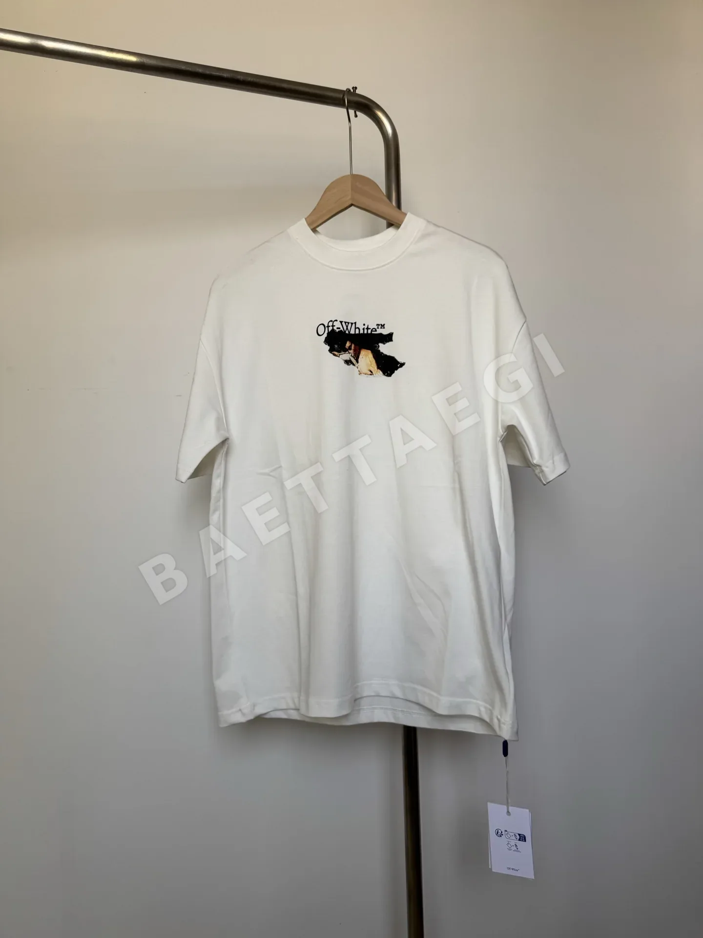 오프화이트 캐릭터 슬로건 화살표 반팔 티셔츠 87055