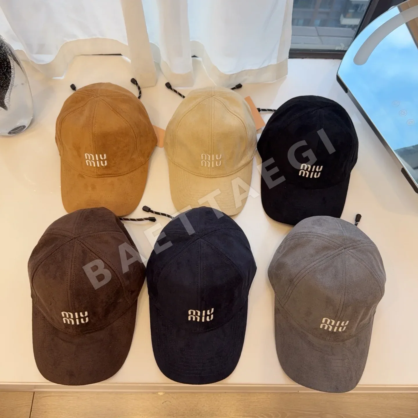 미우미우 스웨이드 드로스트링 야구모자 81377