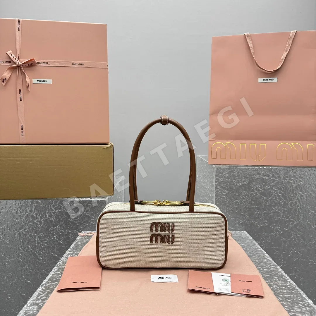 미우미우 캔버스 패치워크 보울링백 68382