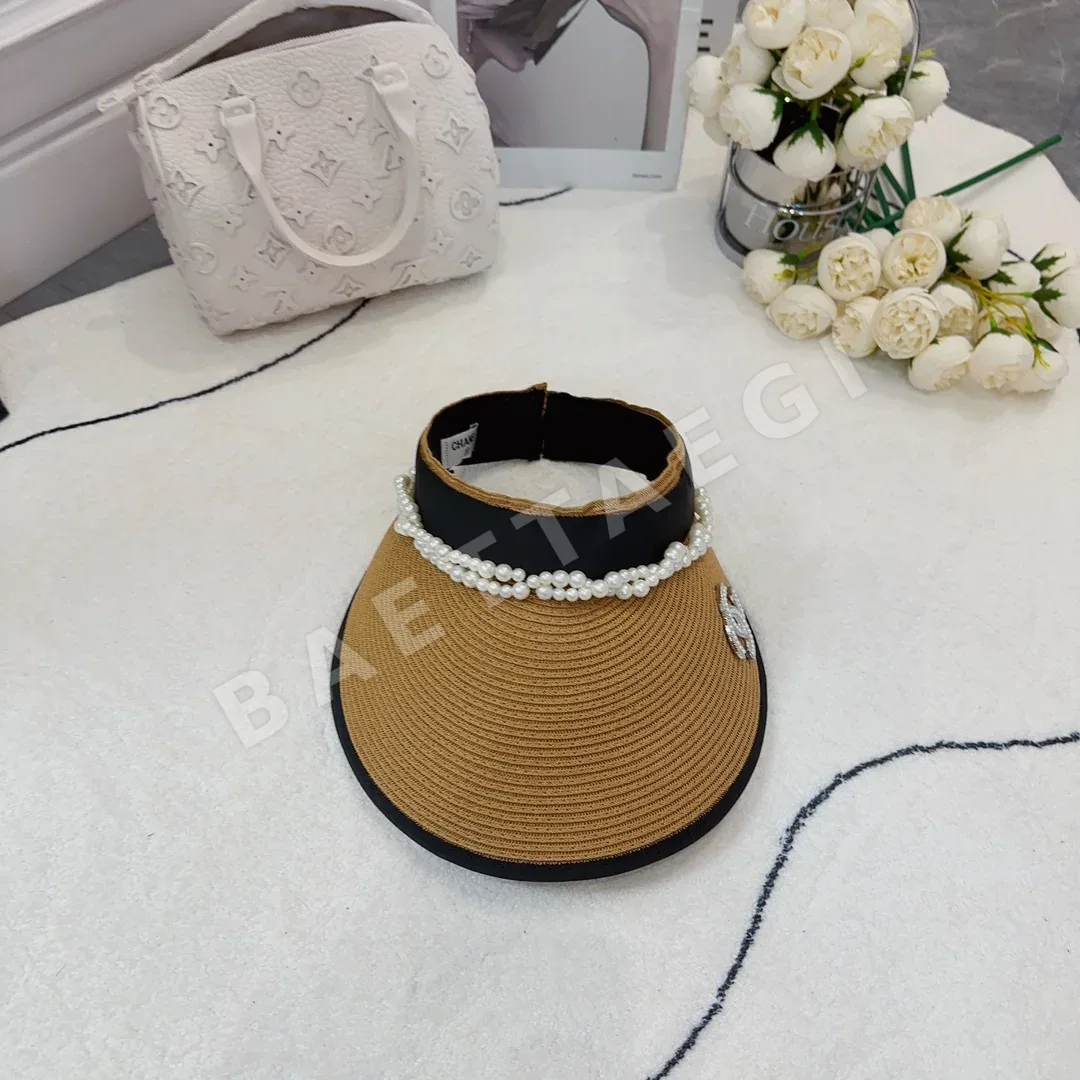 샤넬 진주 장식 자외선 차단 모자 82140