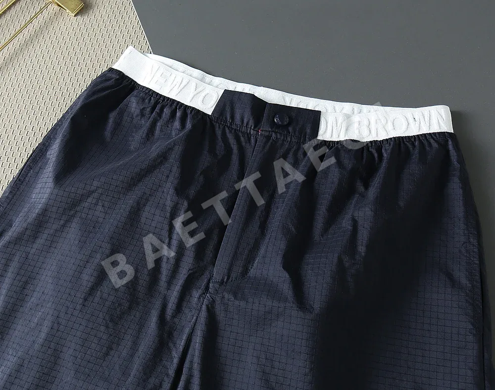 톰브라운 체크 패턴 나일론 반바지 상세 이미지 3
