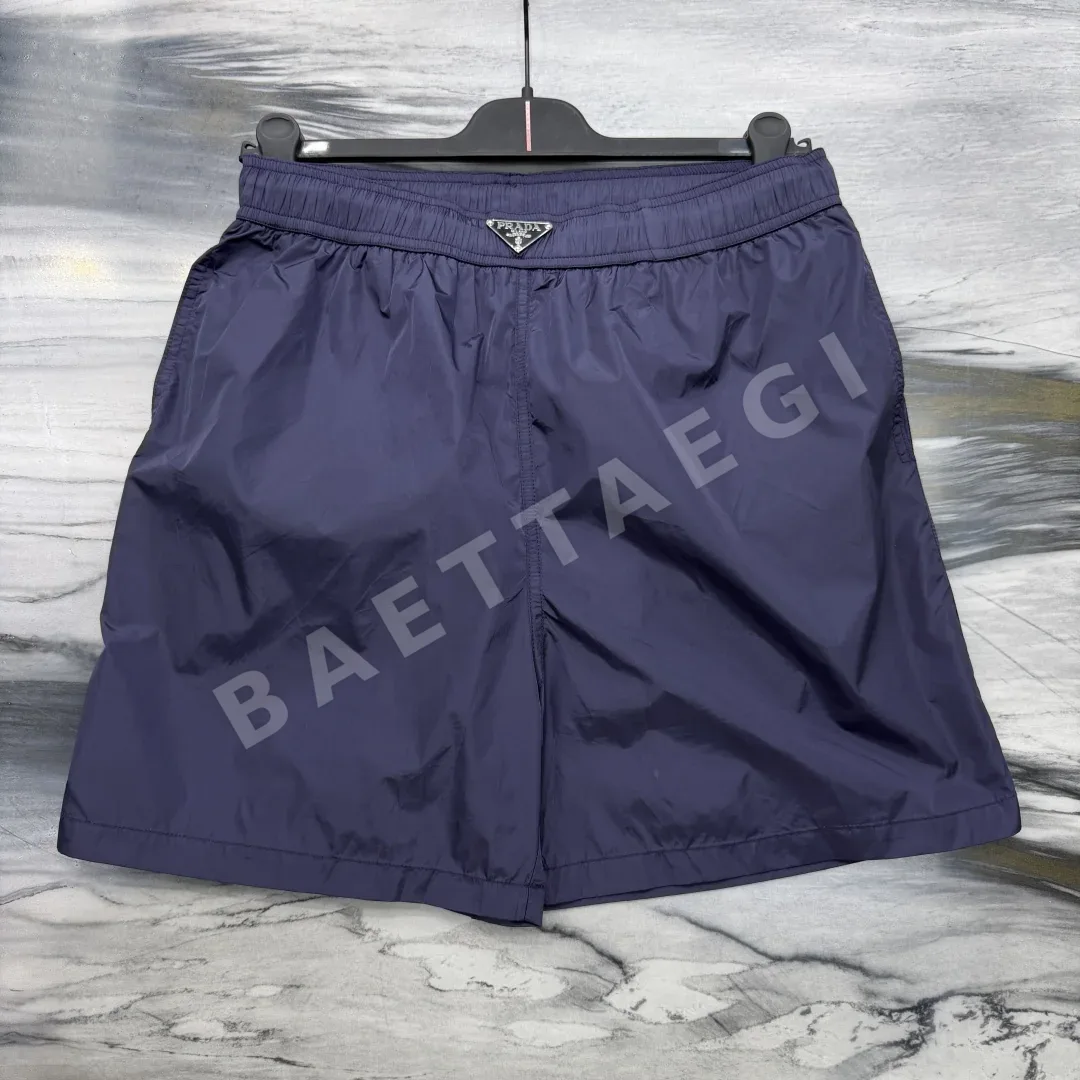 프라다 Re-Nylon 솔리드 컬러 엘라스틱 비치 반바지 41245 Prada Shorts 상세 이미지 4