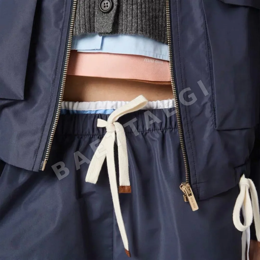 미우미우 레더 드로스트링 나일론 반바지 상세 이미지 4