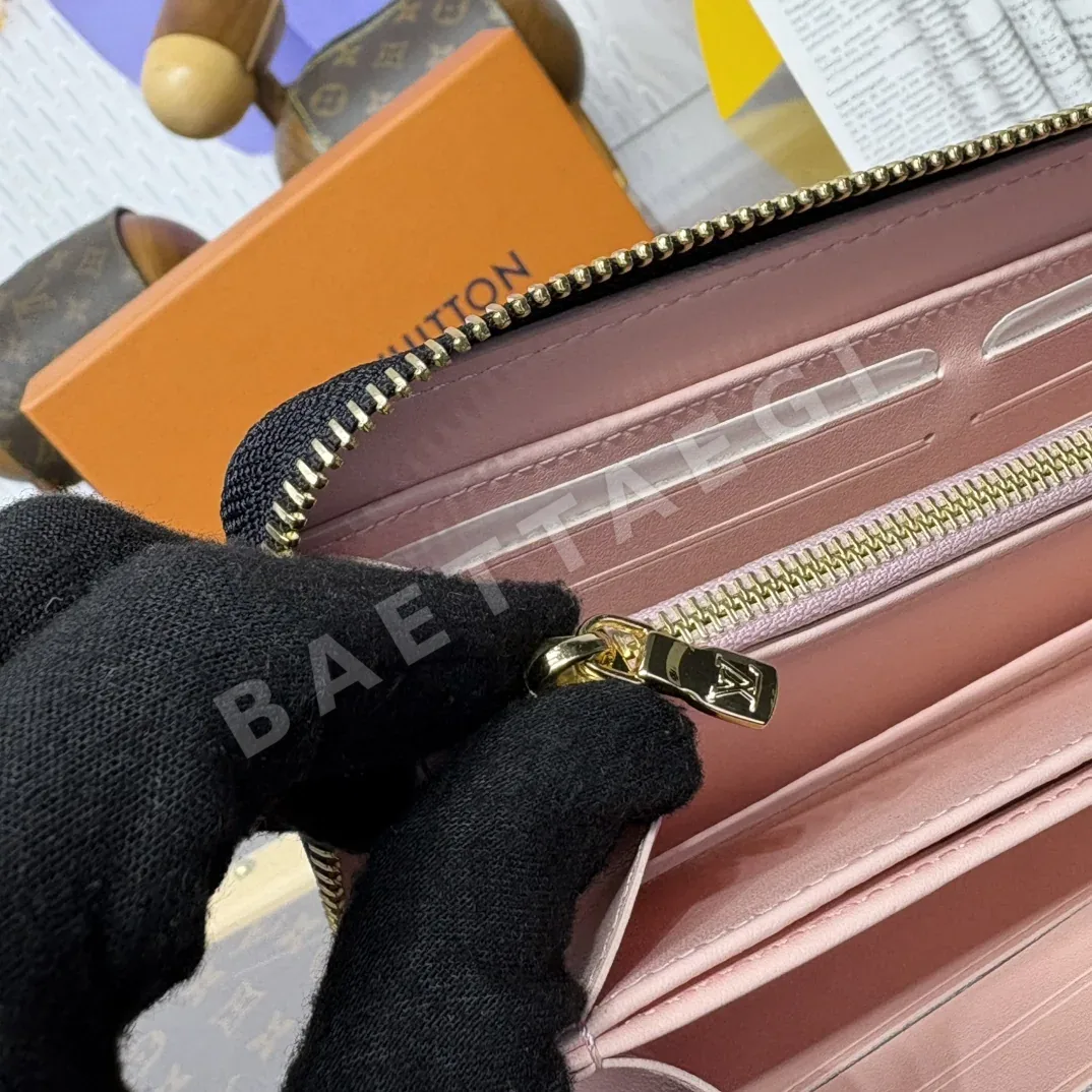루이비통 쿠쌍 모노그램 지퍼업 지갑 상세 이미지 7