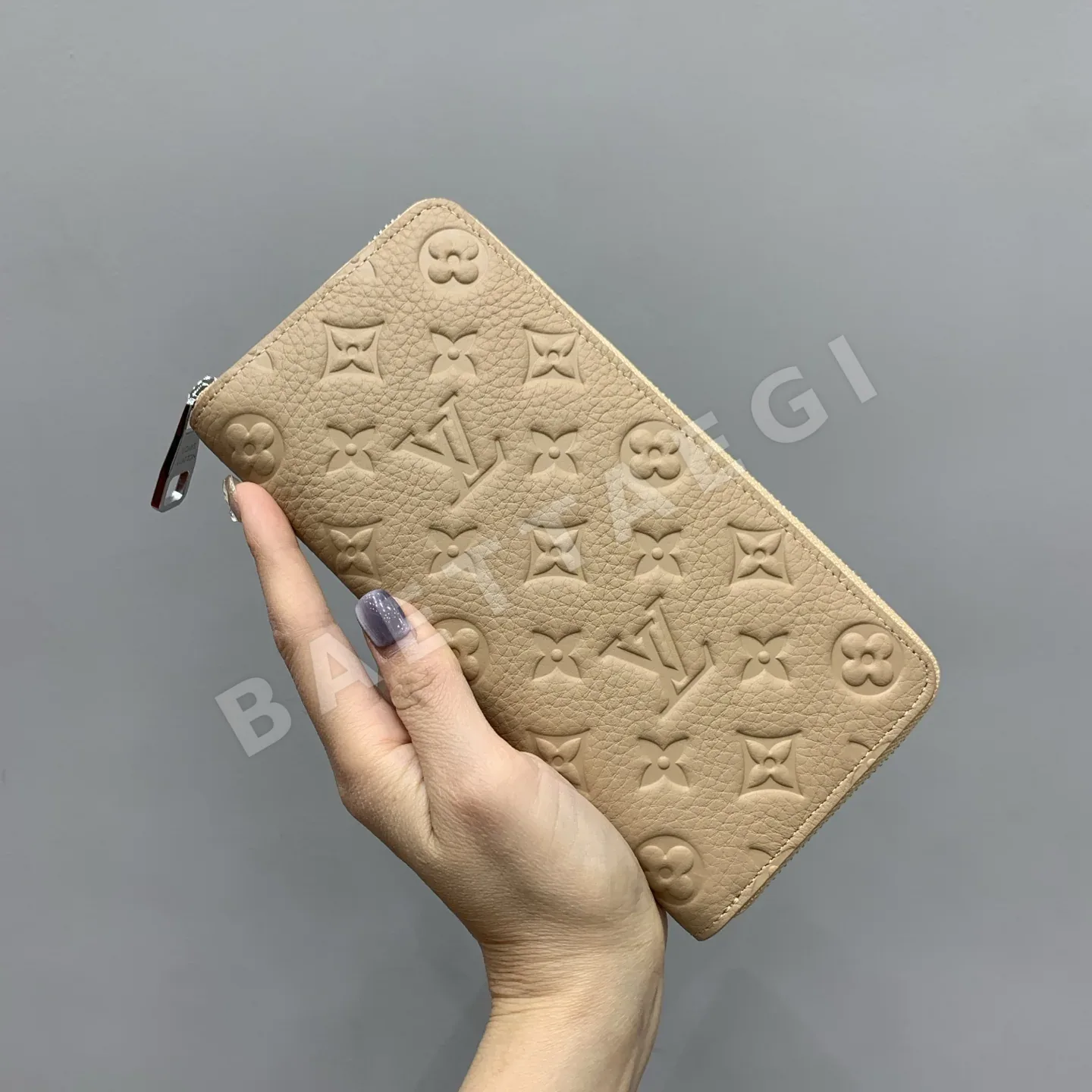 루이비통 세로형 지퍼 지갑 M14141 38582