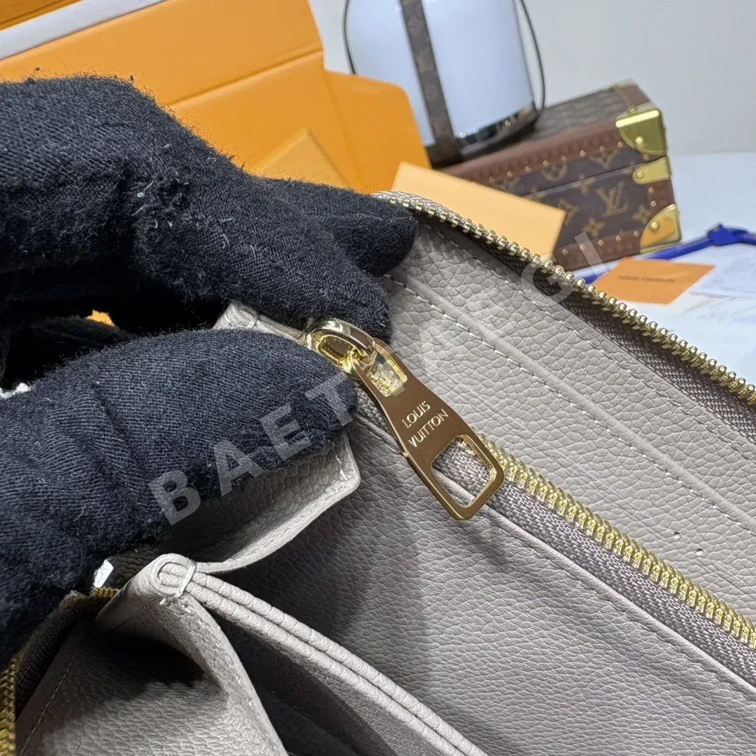 루이비통 지피 지퍼 지갑 모노그램 앙프랑트 상세 이미지 7