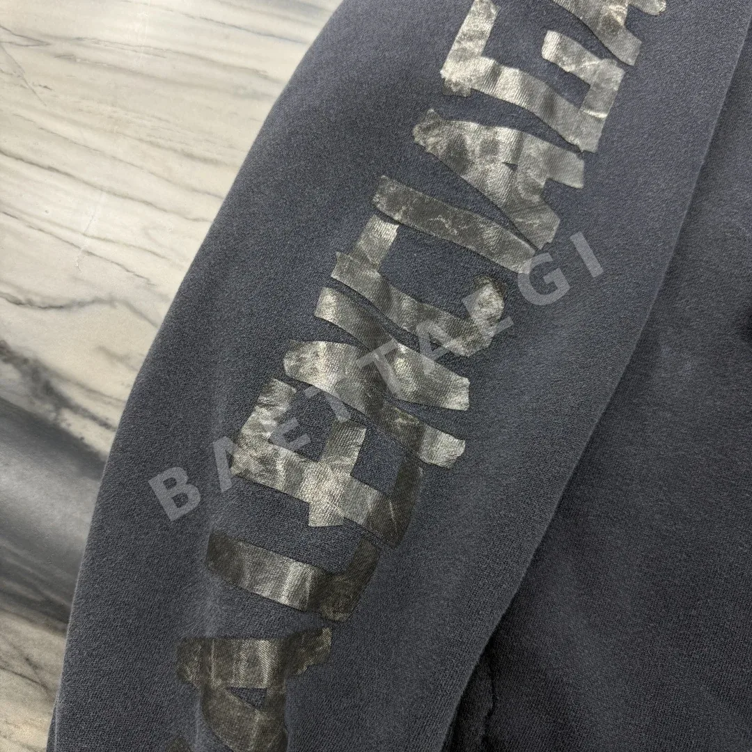 발렌시아가 로고 프린트 포켓 후드티 상세 이미지 7