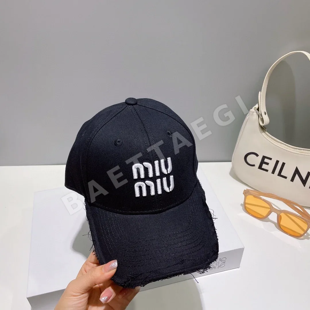 미우미우 데님 자수 버킷햇 상세 이미지 2