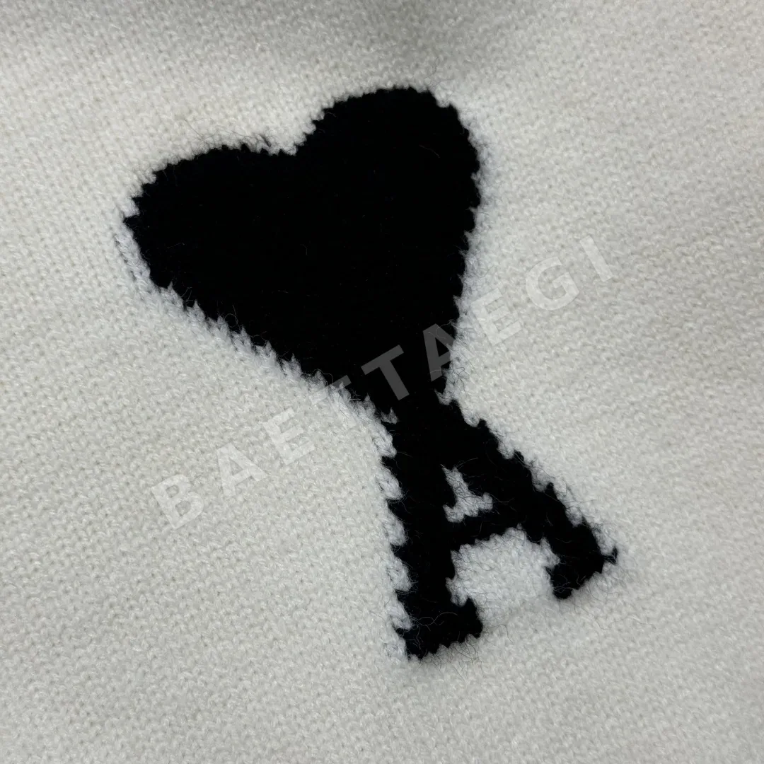 아미 하트 패턴 울 니트 폴로셔츠 상세 이미지 8
