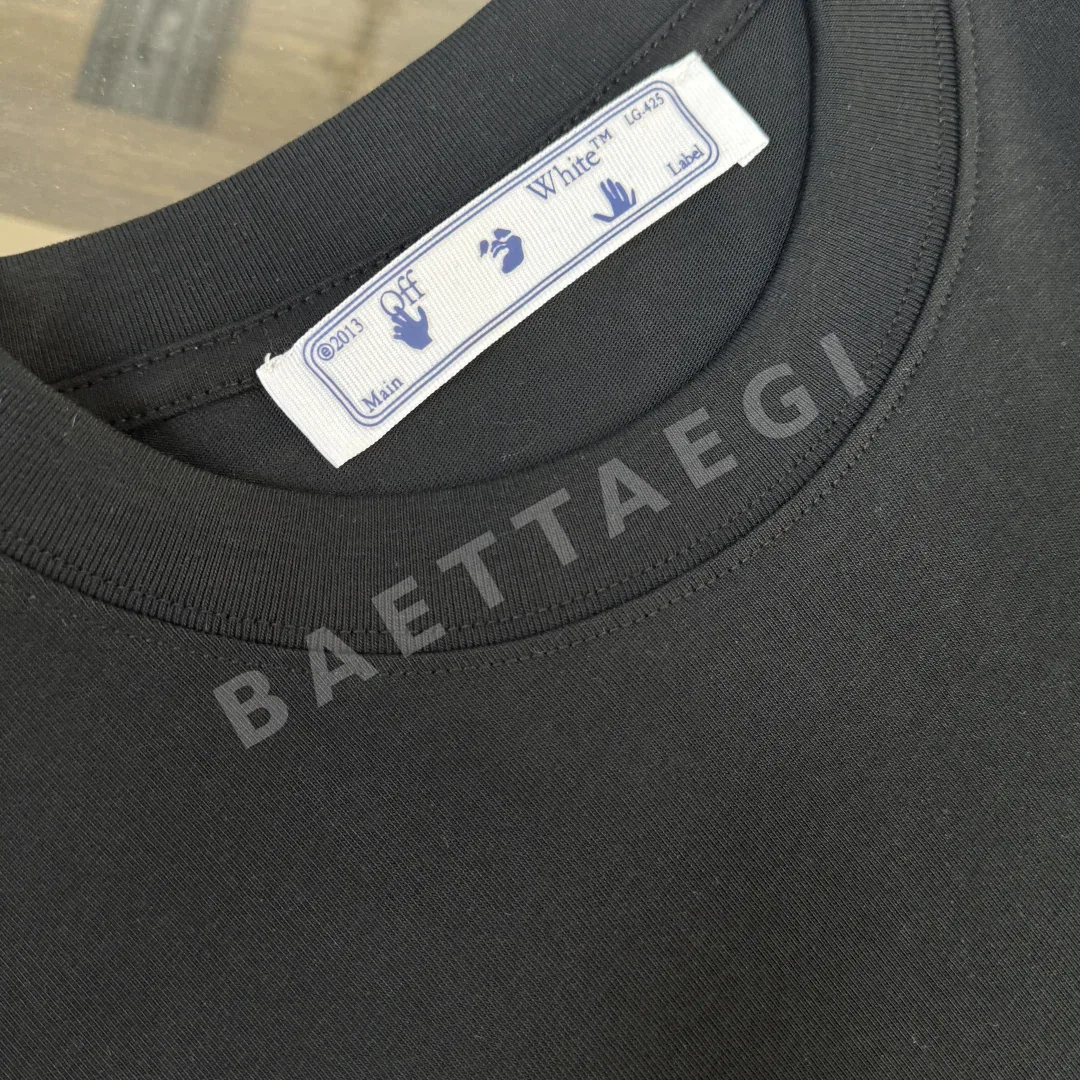 오프화이트 크루넥 반팔 티셔츠 상세 이미지 5