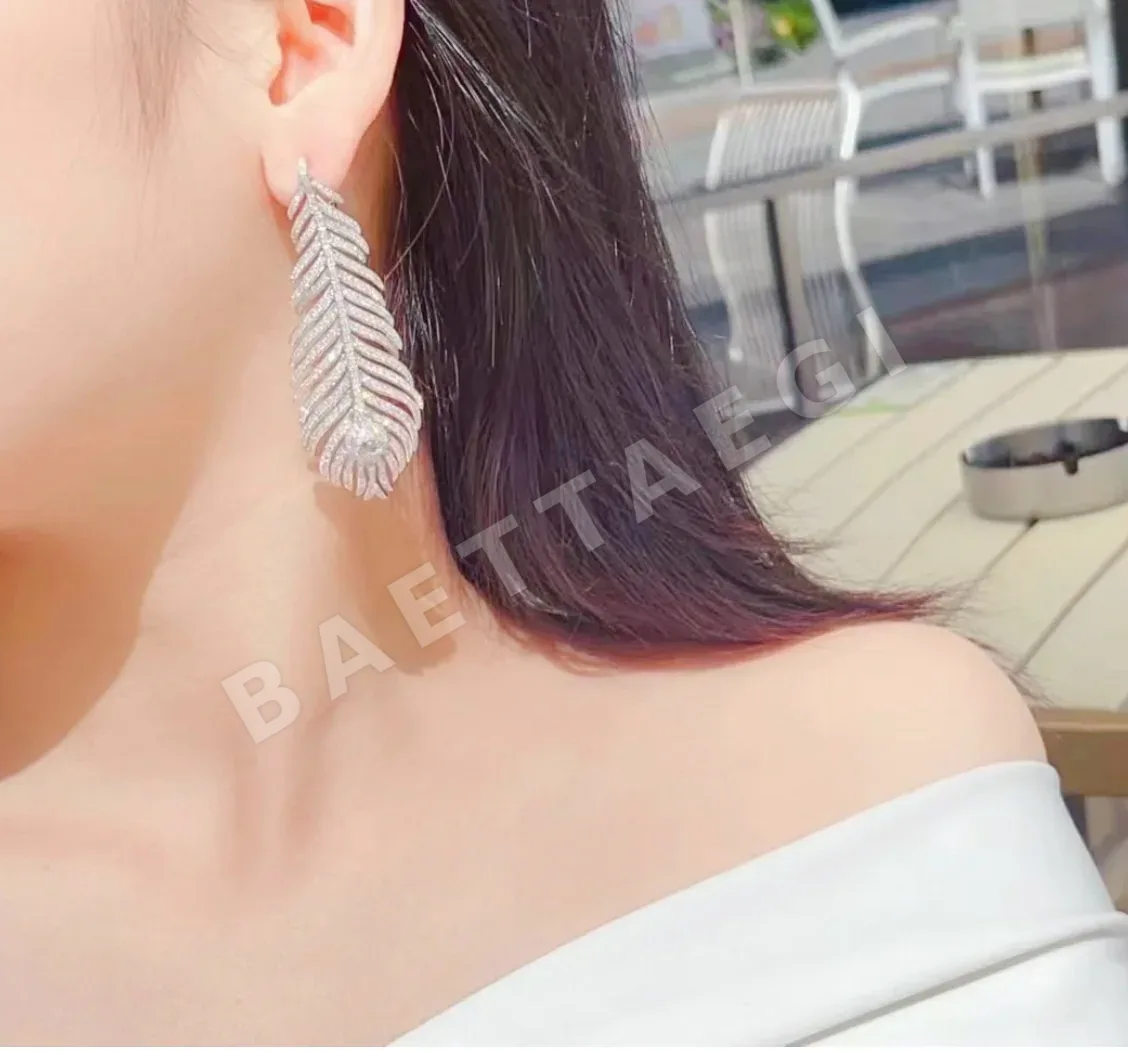 부쉐론 깃털 모양 골드 귀걸이 상세 이미지 3