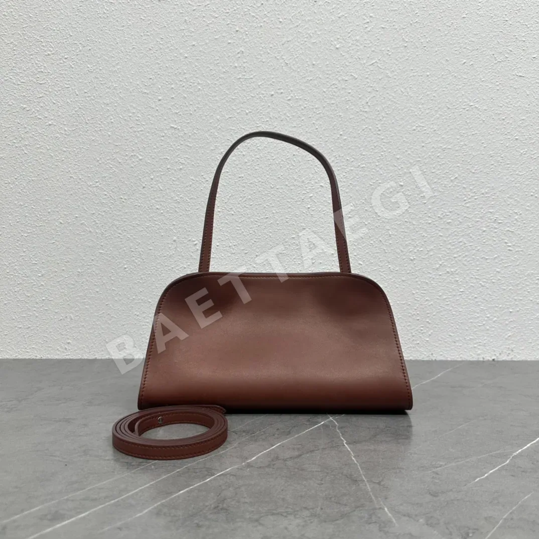 더로우 페기 새들 가죽 클러치백 TR-063