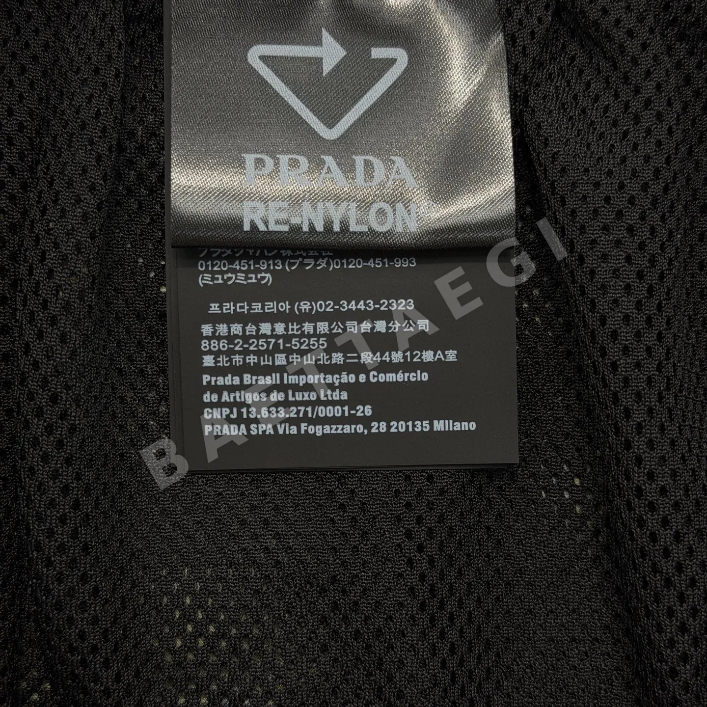 프라다 데이지 프린트 나일론 남성 반바지 상세 이미지 9