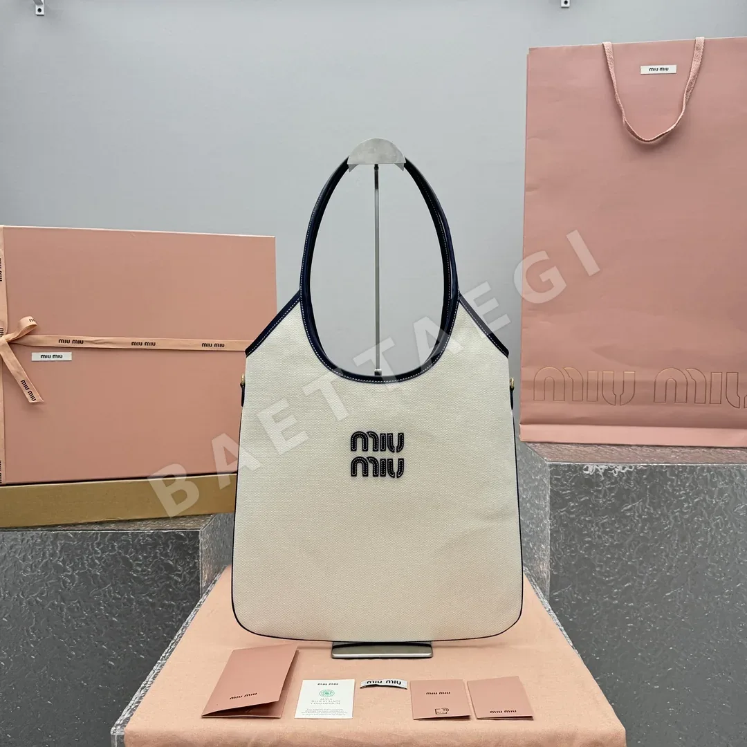 미우미우 블루 캔버스 호보백 68231