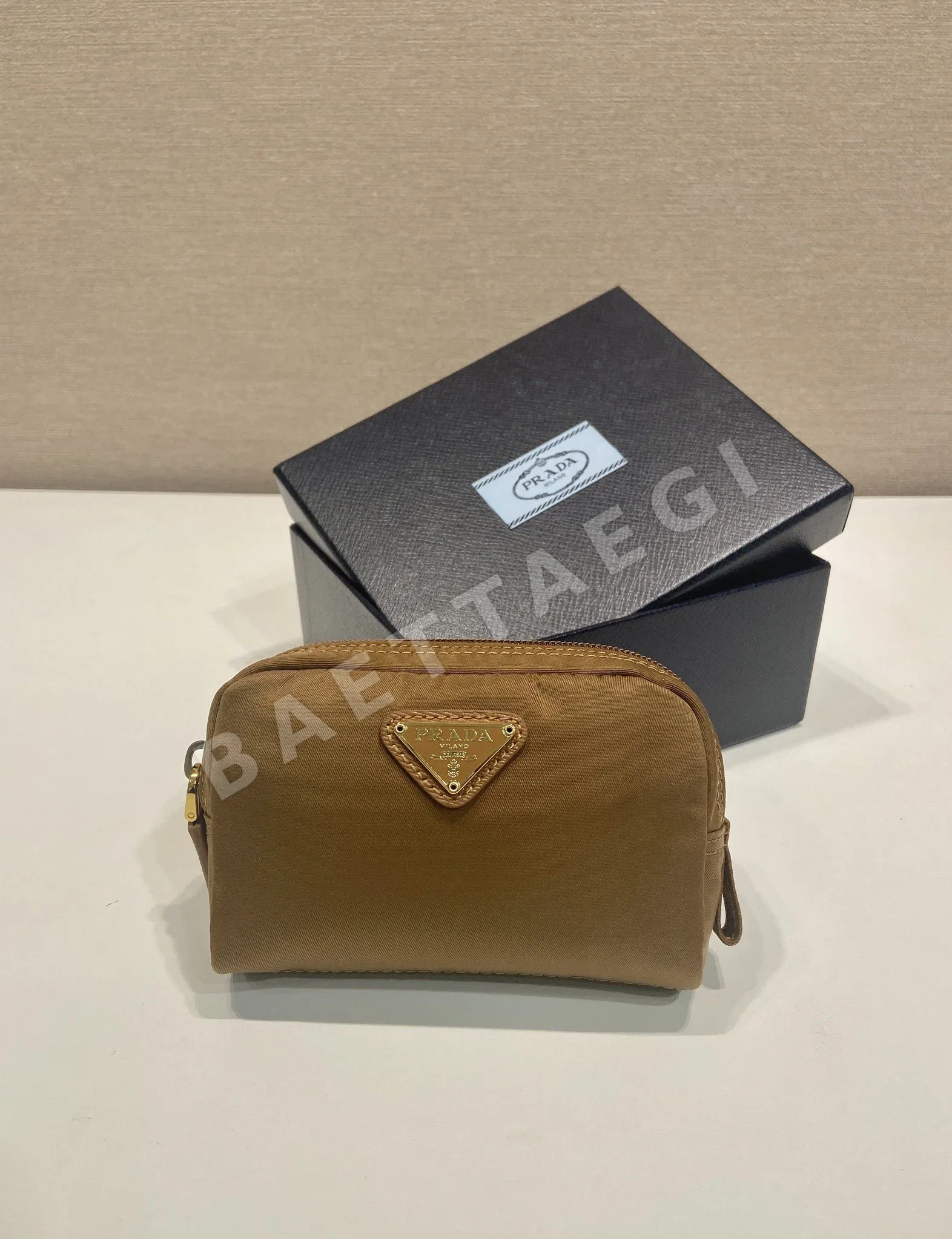 프라다 리나일론 미니 클러치백 1NA339 66636