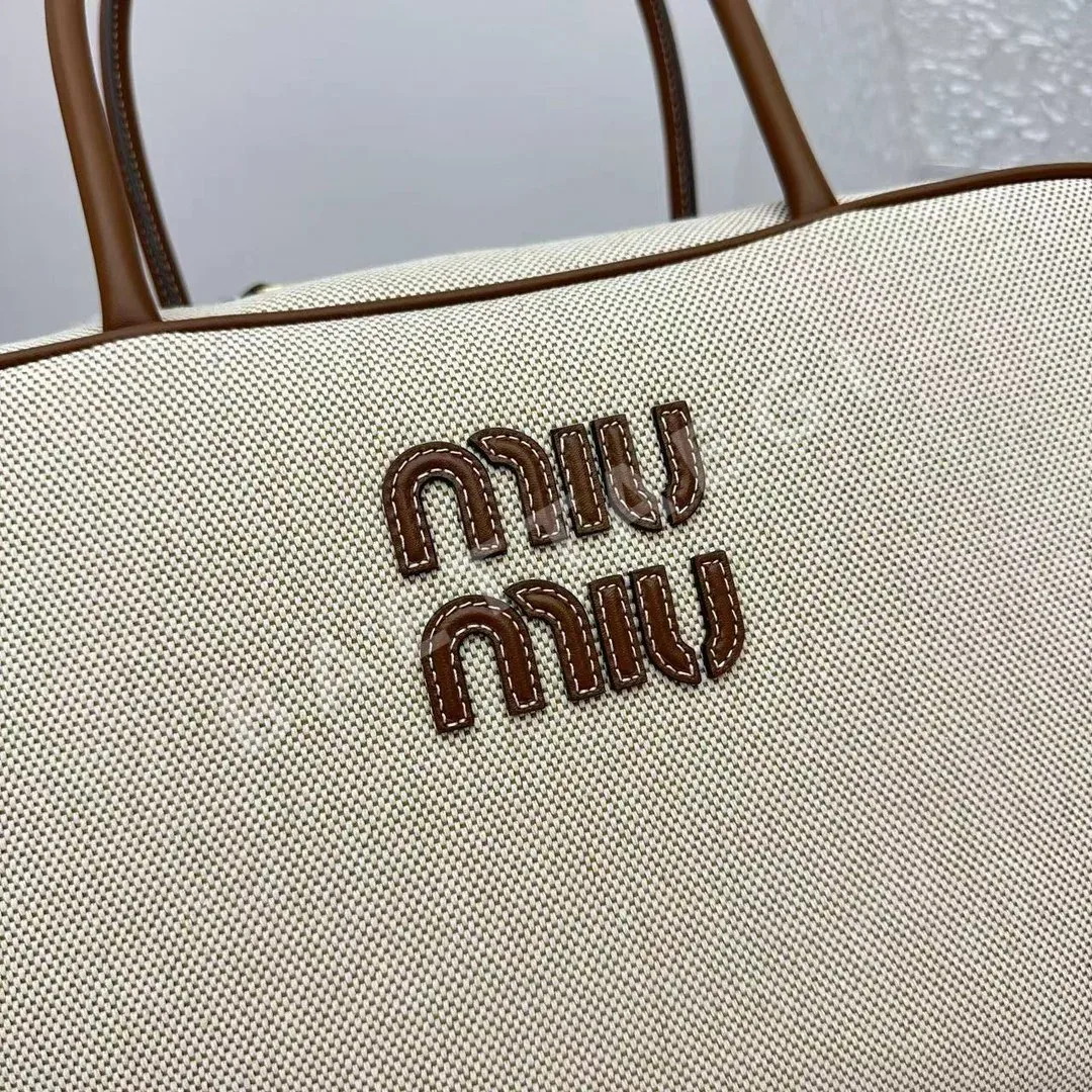 미우미우 브라운 캠버스 볼링백 상세 이미지 5
