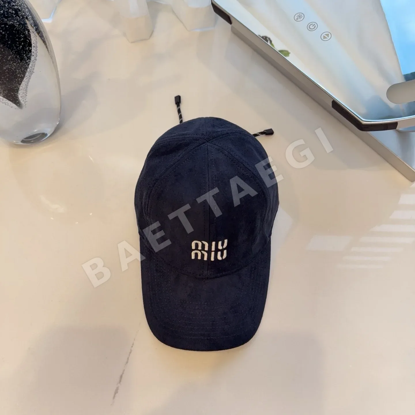 미우미우 스웨이드 드로스트링 모자 81380