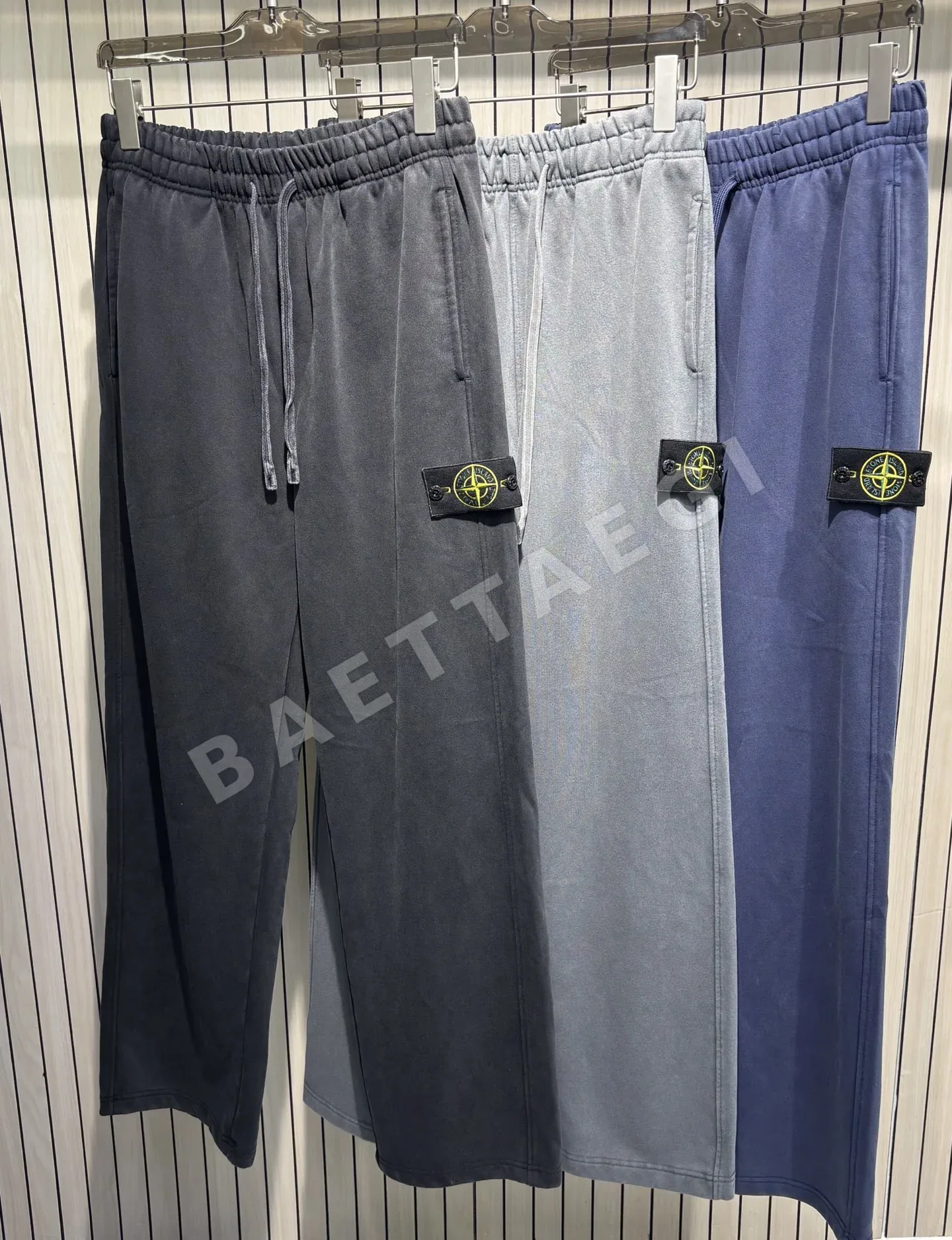스톤아일랜드 손상 가공 캐주얼 스웨트팬츠 50911
