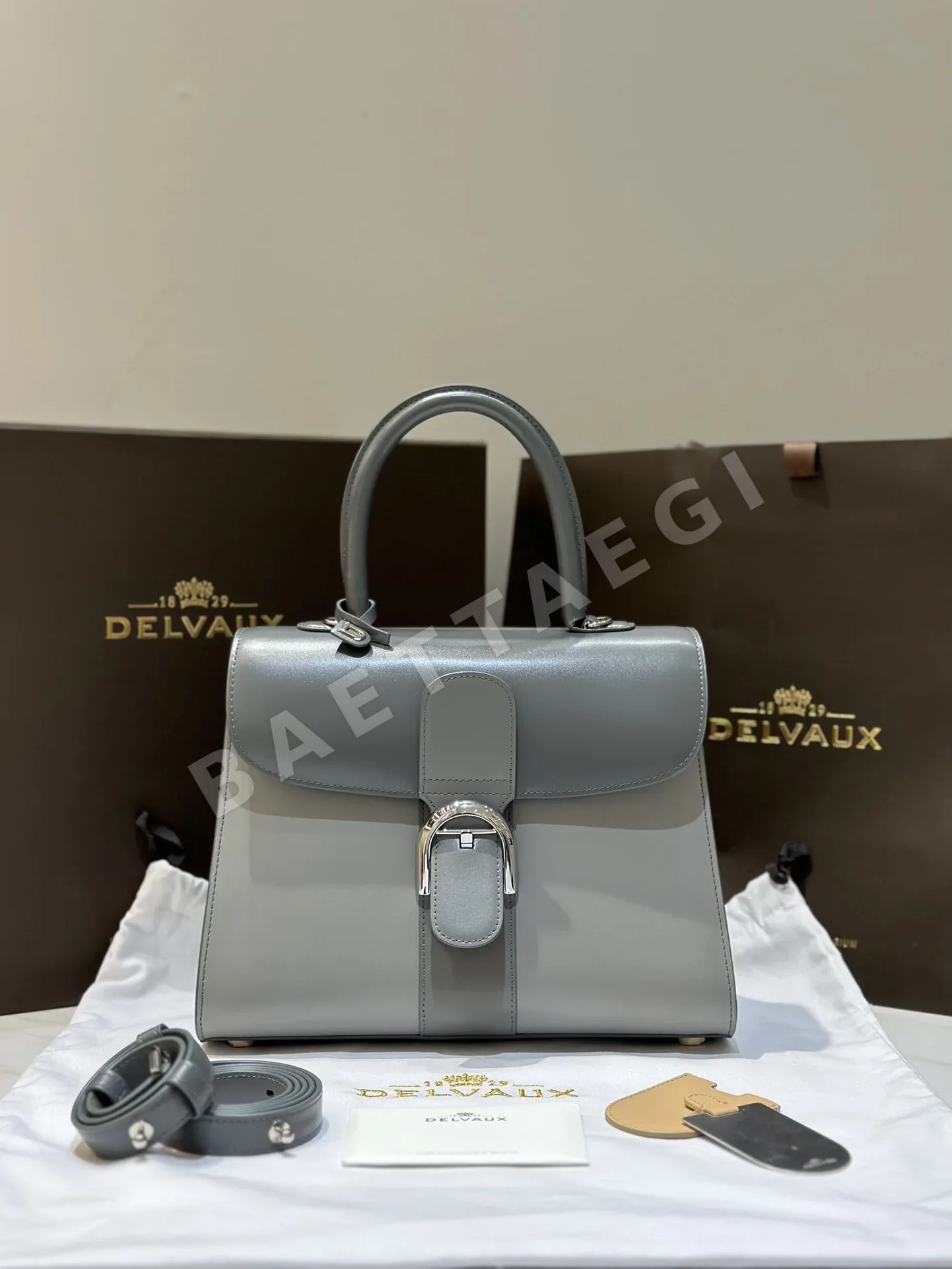 델보 더블 링 브릴리언트 박스 가죽 숄더백 99120066