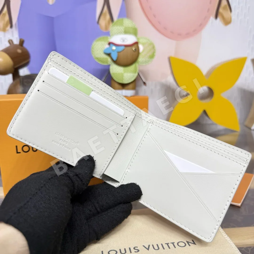 루이비통 모노그램 셰도우 카프스킨 멀티플 월렛 지갑 상세 이미지 7