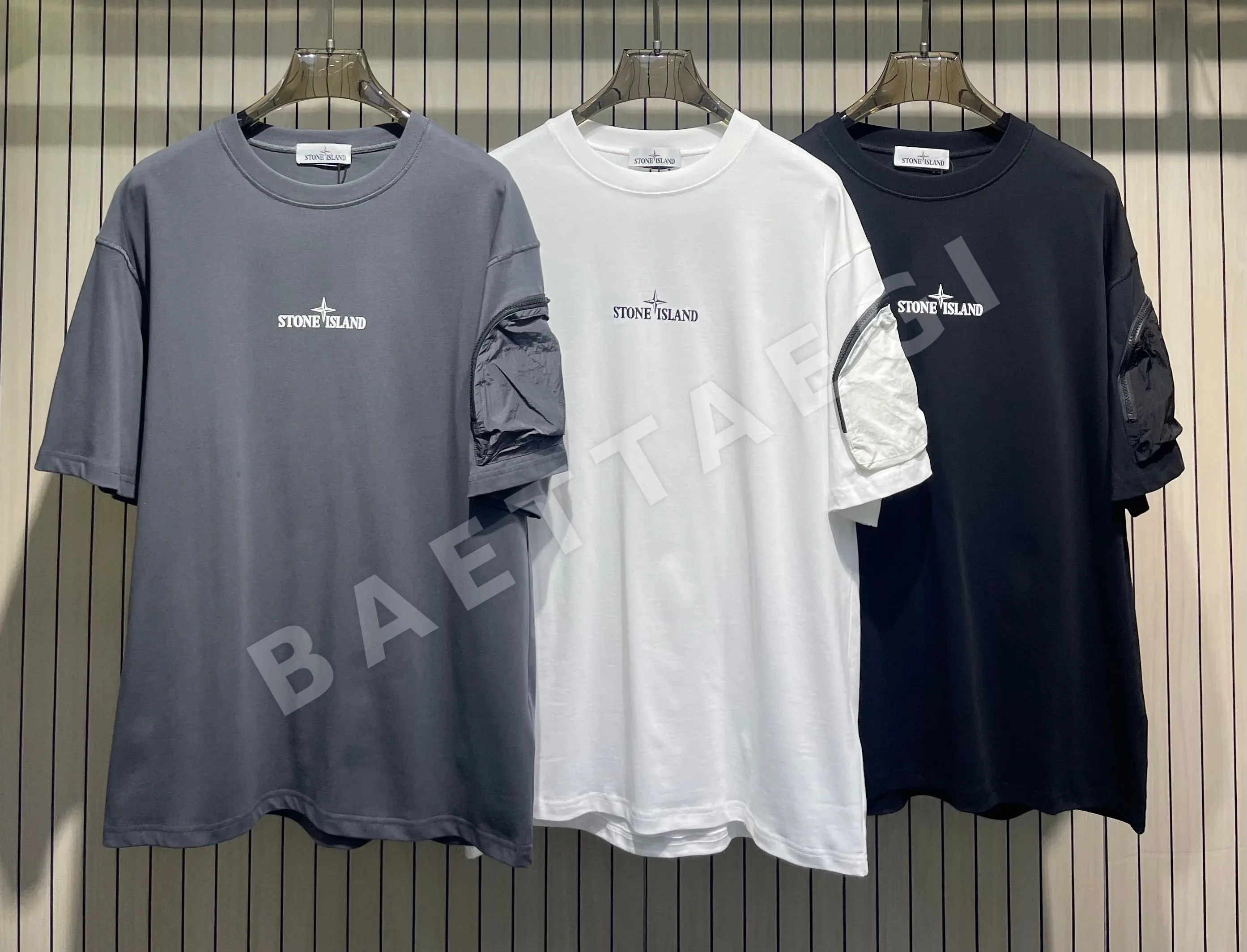 스톤아일랜드 프린트 지퍼 포켓 반팔 티셔츠 47849