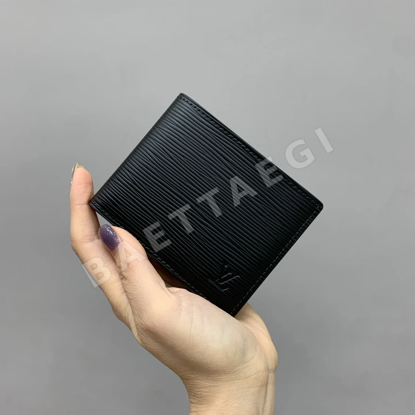 루이비통 오리가미 물결무늬 반지갑 M60332