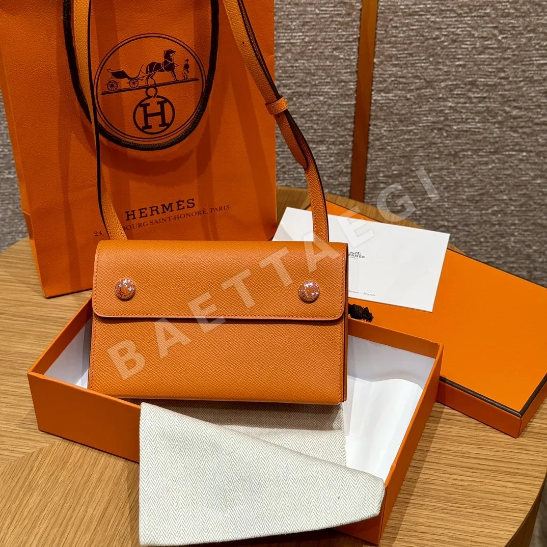 에르메스 오렌지 엡솜 가죽 스냅 지갑 23257