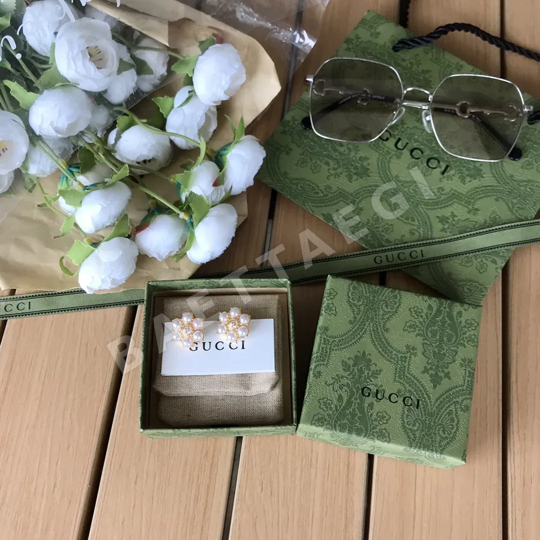 구찌 더블 G 앤티크 골드 귀걸이 55900