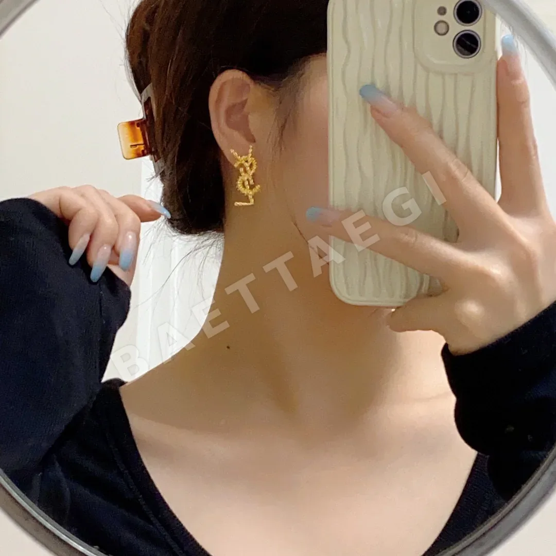 생로랑 골드 스터드 귀걸이 65602