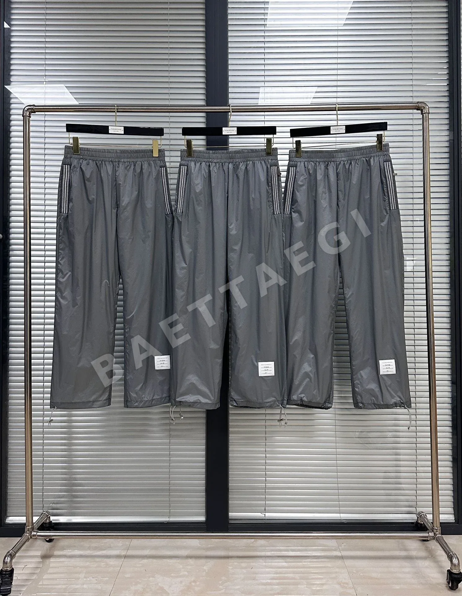 톰브라운 체크 리브 메시 포켓 남성 나일론 팬츠 46741
