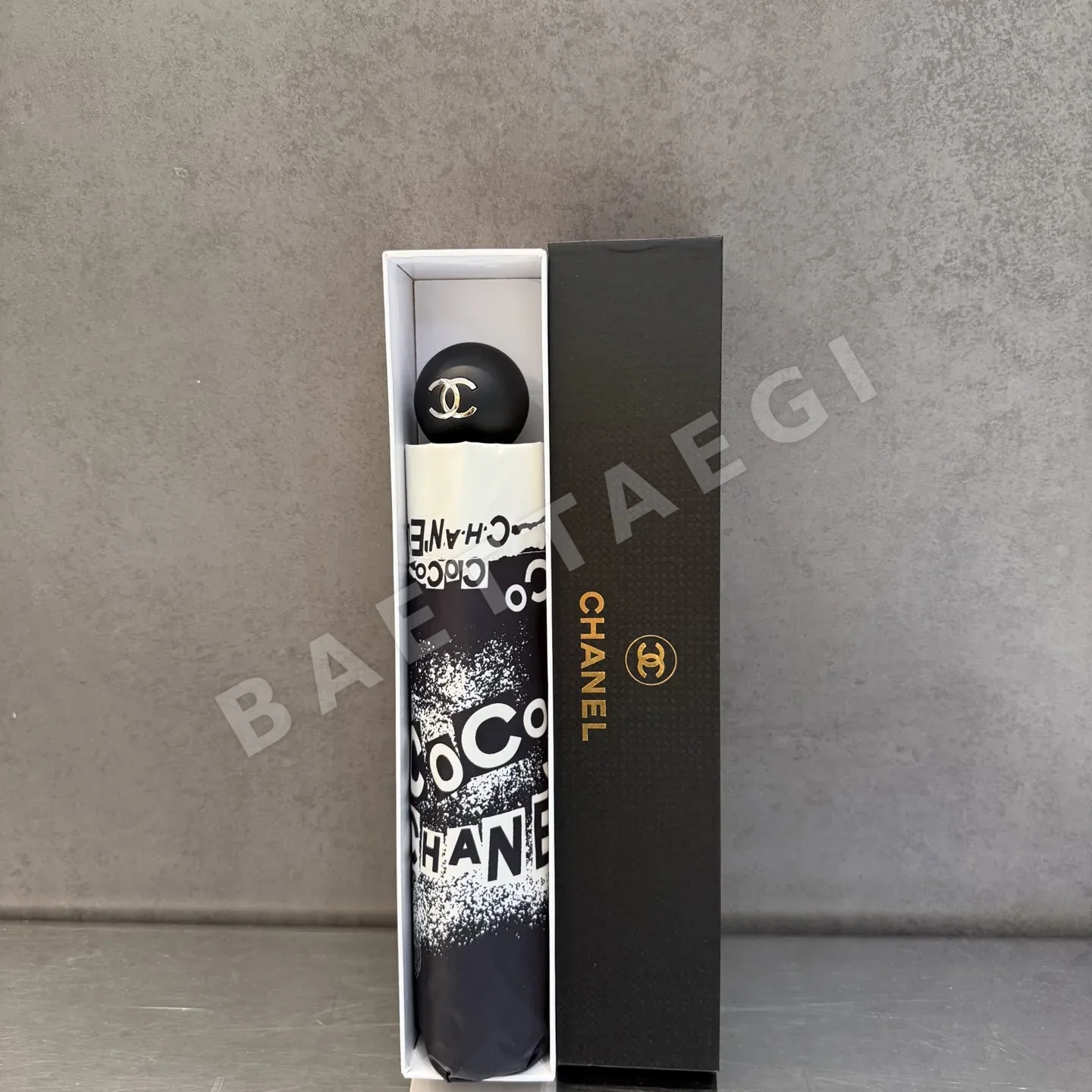 샤넬 삼단 자동 접이식 우산 85393