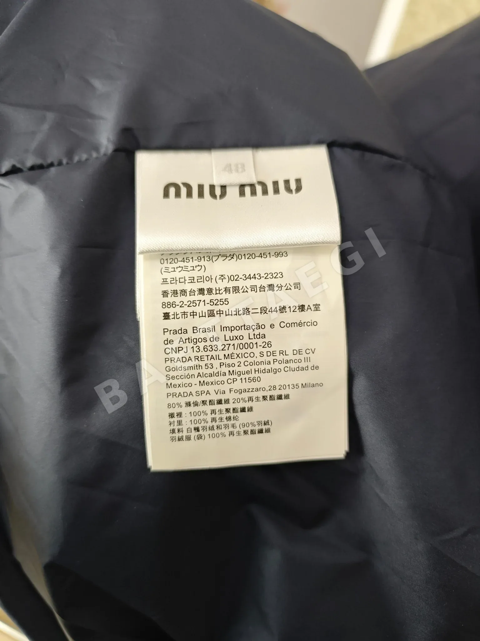 미우미우 테크니컬 퐁제 다운 재킷 상세 이미지 9