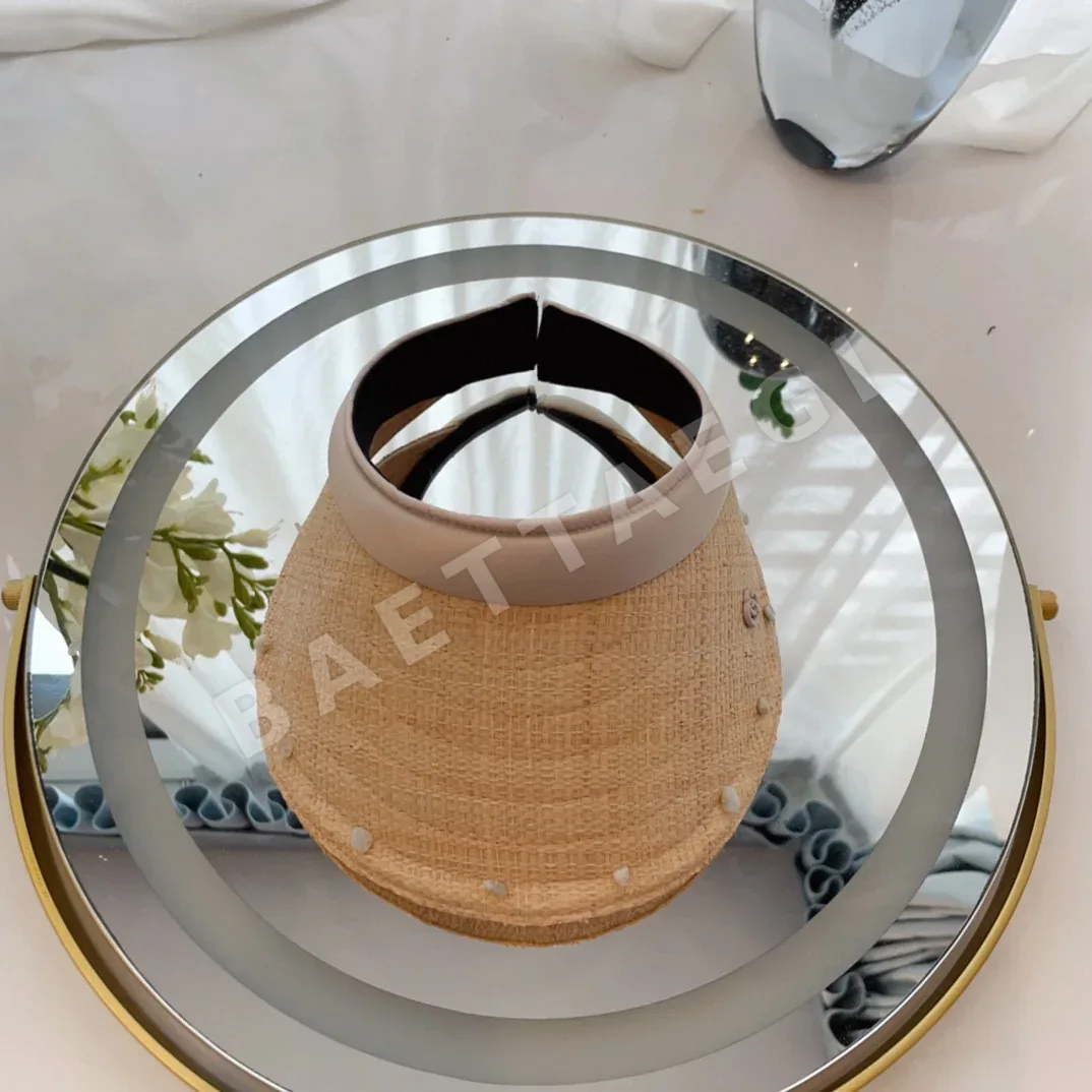 구찌 라피아 소재 바이저 햇 78383