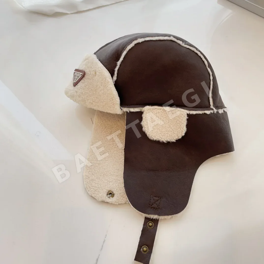프라다 램스킨 가죽 이어머프 84874