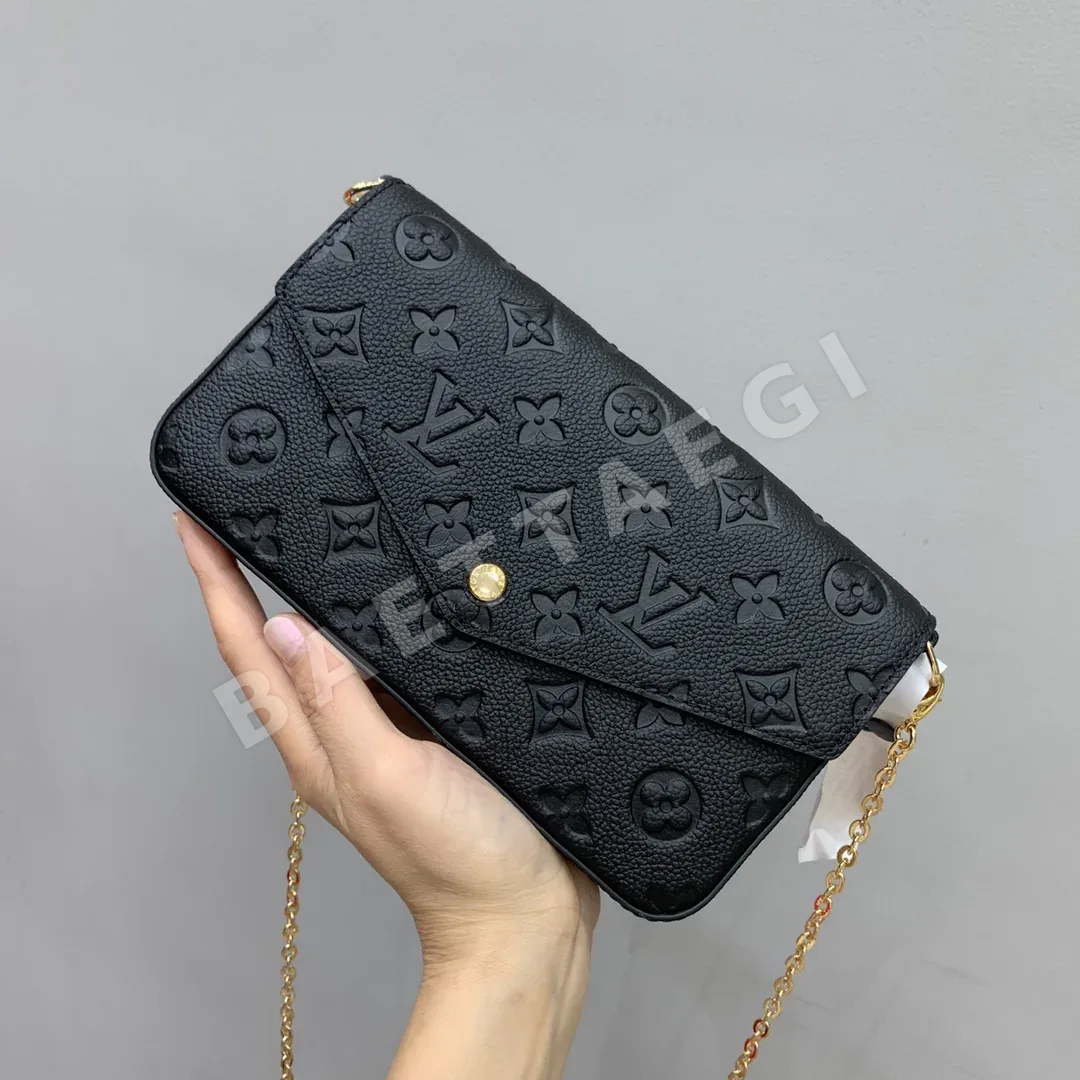 루이비통 로고 압화 검정 소가죽 지갑 M82477