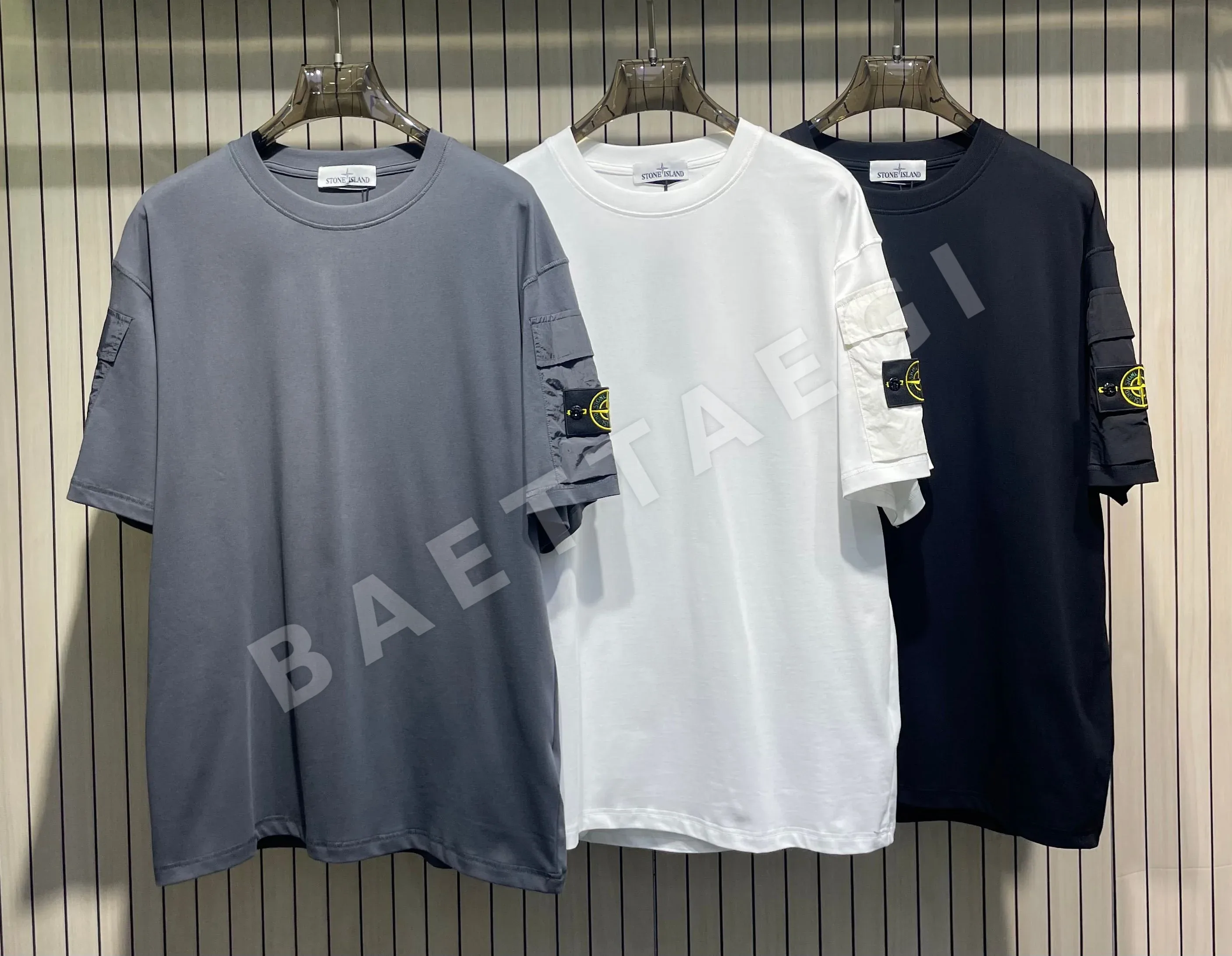 스톤아일랜드 슬리브 포켓 크루넥 반팔 티셔츠 47850