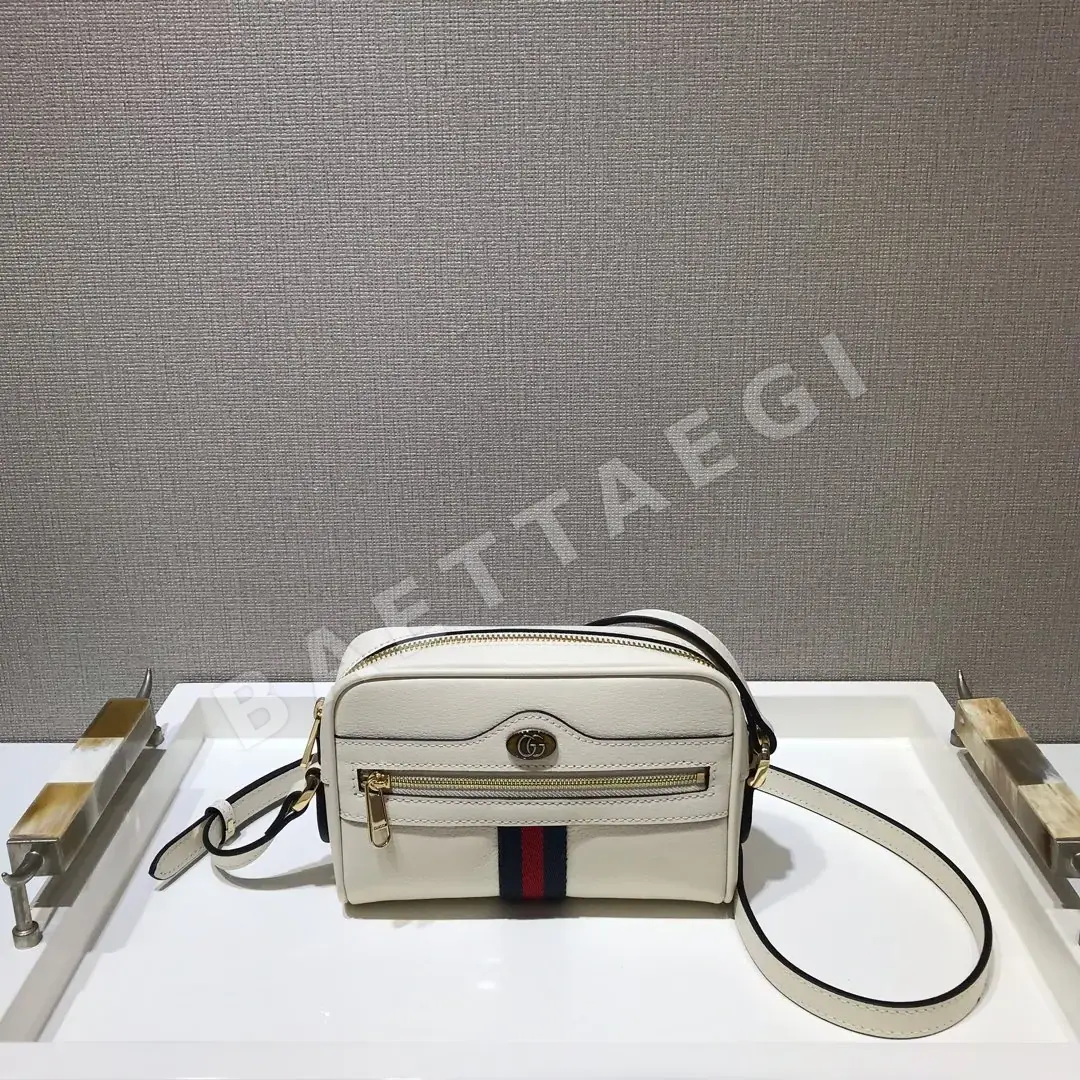 구찌 오피디아 화이트 가죽 메시백 517350