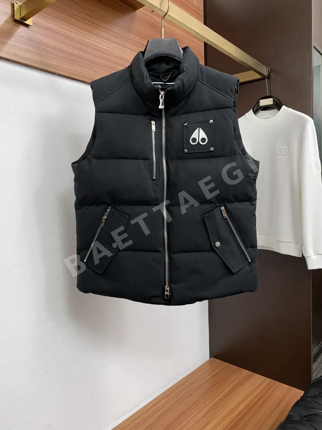 무스너클 다운 패딩 조끼 207570