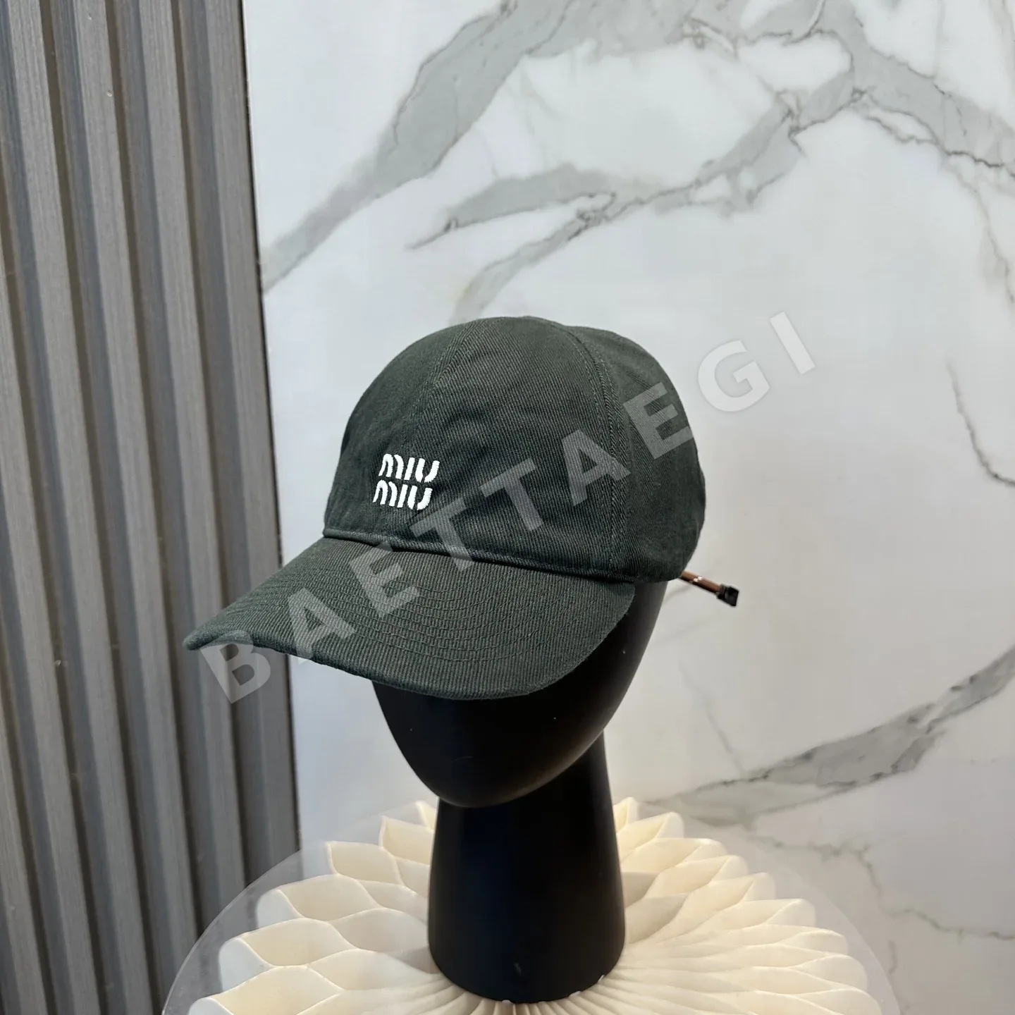 미우미우 컬러풀 드로스트링 캡 120356